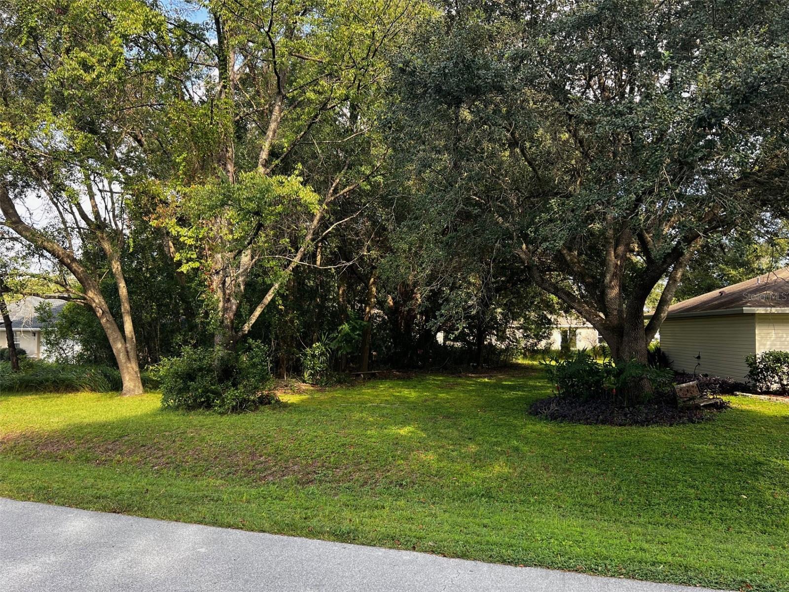 Very nice buildable and partially cleared lot in Silver Spring Shores! Close to the post office, shopping, restaurants and more! Great location on a quiet street!