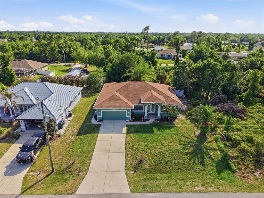 Photo of 5075 Delight Ave, North Port, FL 34288 (MLS # C7524940)