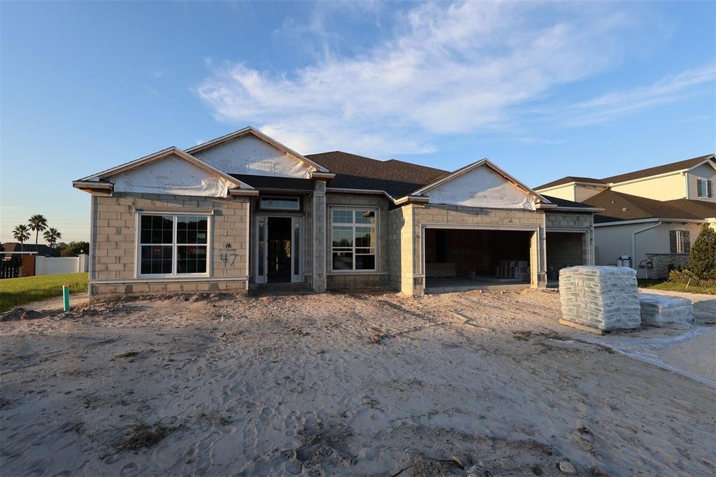 Photo of 17007 Overstory Road, Orlando, FL 32820 (MLS # O6447046)
