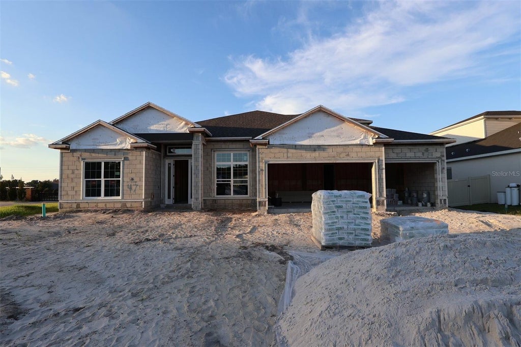 Photo of 17007 Overstory Road, Orlando, FL 32820 (MLS # O6447046)