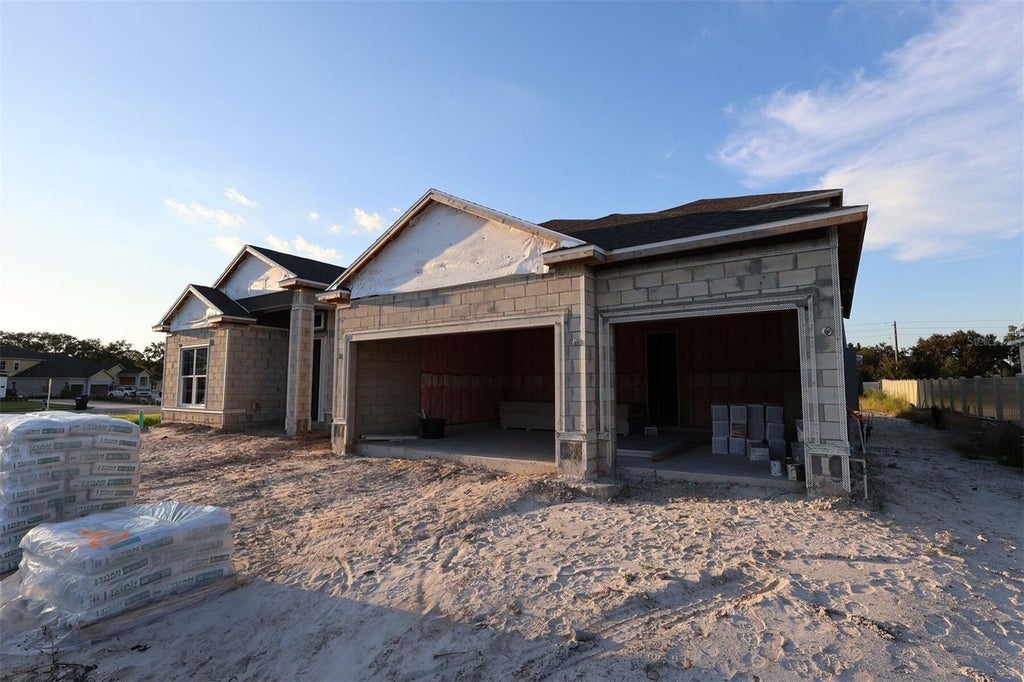 Photo of 17007 Overstory Road, Orlando, FL 32820 (MLS # O6447046)