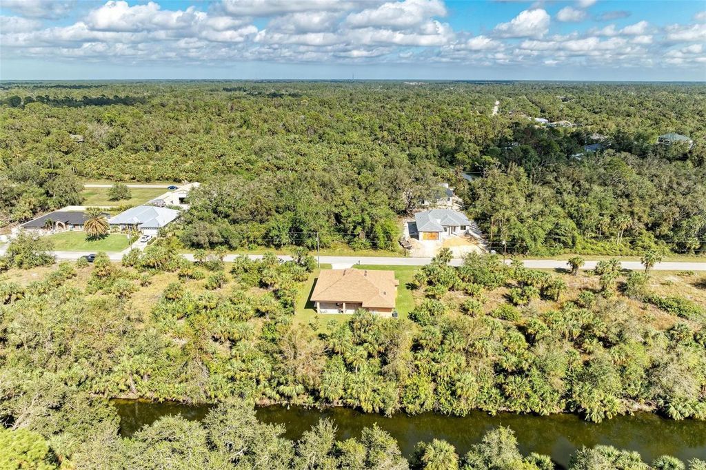 Photo of 397 Doniphan Drive, Port Charlotte, FL 33954 (MLS # TB8486956)