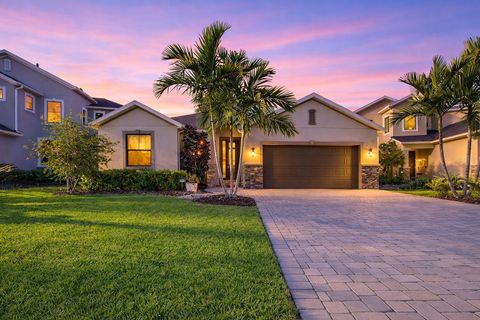 Photo of 7663 Poulicny Lane, Melbourne, FL 32940 (MLS # O6380635)