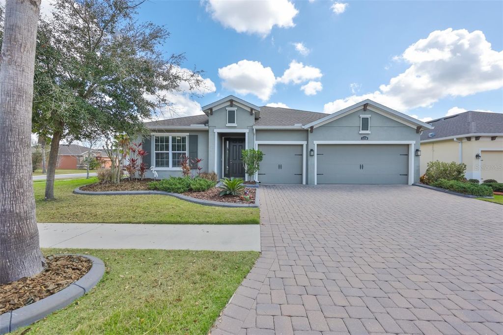 Photo of 11718 Lake Lucaya Drive, Riverview, FL 33579 (MLS # TB8485166)