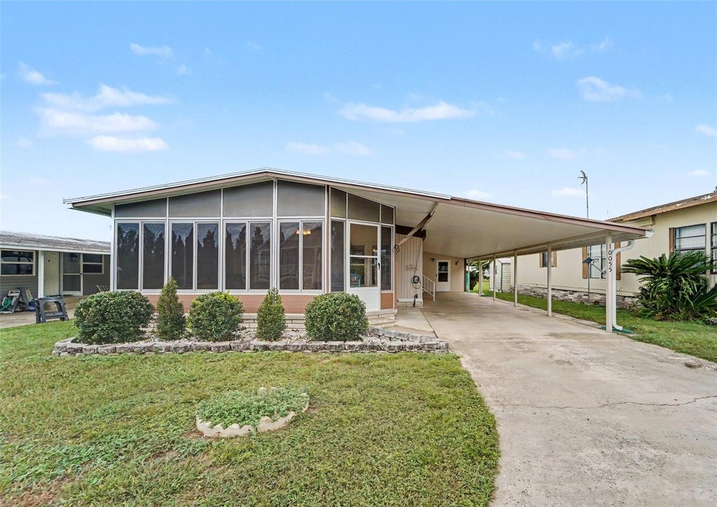 Photo of 10055 Collingwood Avenue, Dade City, FL 33525 (MLS # TB8555054)