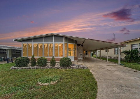 Photo of 10055 Collingwood Avenue, Dade City, FL 33525 (MLS # TB8555054)