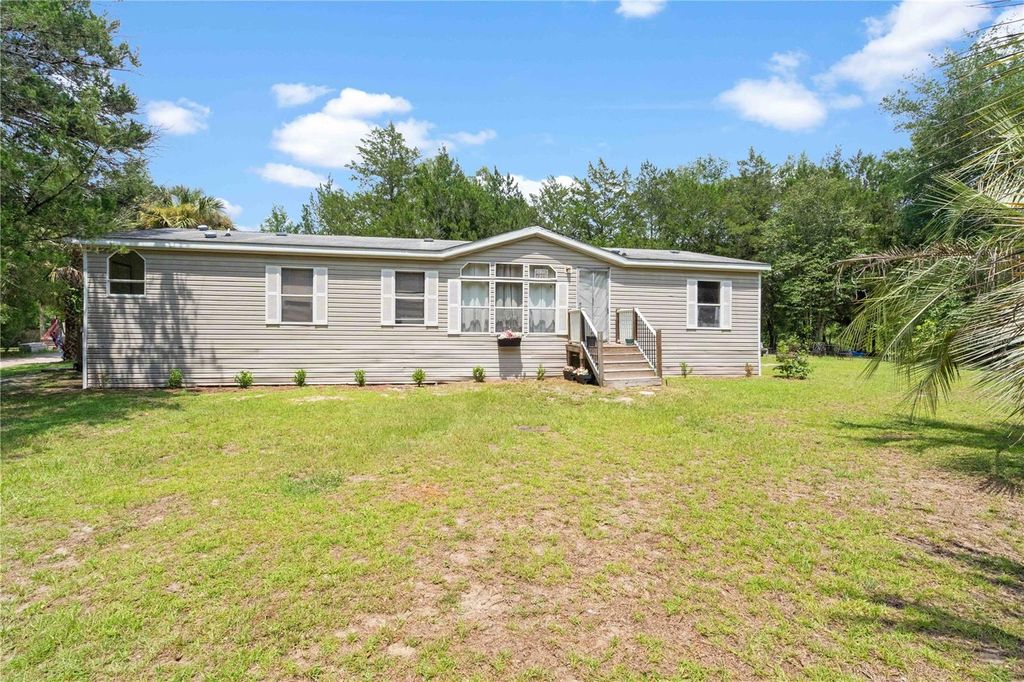 Photo of 151 NE 164th Avenue, Williston, FL 32696 (MLS # OM727656)