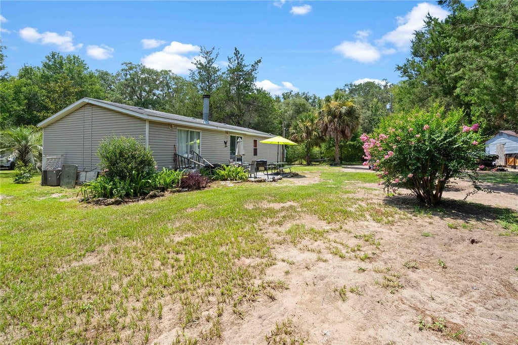 Photo of 151 NE 164th Avenue, Williston, FL 32696 (MLS # OM727656)