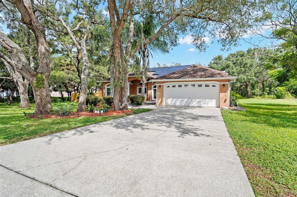 Photo of 13925 Echo Mountain Drive, Hudson, FL 34667 (MLS # TB8546872)