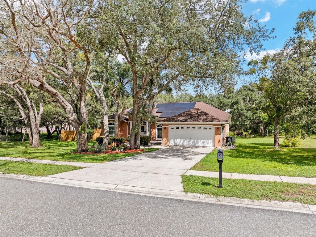 Photo of 13925 Echo Mountain Drive, Hudson, FL 34667 (MLS # TB8546872)