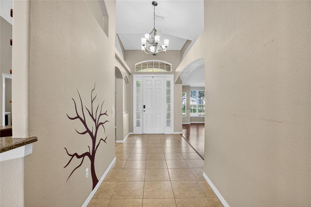 Photo of 6721 Sparkling Way, Wesley Chapel, FL 33545 (MLS # TB8429815)