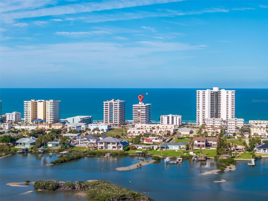 IF YOU ARE LOOKING FOR A VIEW THIS IS A MUST SEE THIS SPECTACULAR VIEW THAT PICTURES CAN'T CAPTURE. Walk into this Breathtaking Dual Water Views at 3743 S Atlantic Ave, Unit 7A — Daytona Beach Shores.  Direct ocean front condo with private beach access.   
Perched high above the sparkling waters of the Halifax River and the Atlantic Ocean, this stunning 3-bedroom, 2-bathroom OCEAN FRONT condominium is a rare gem that redefines coastal living. Freshly painted throughout and thoughtfully updated, Unit 7A at 3743 S Atlantic Avenue delivers an unparalleled panoramic experience the moment you step through the door.
Floor-to-ceiling windows wrap the entire living space in natural light, framing ever-changing vistas of shimmering river waters to the west and rolling ocean waves to the east — a dual water view that few properties can match. Watch the sun rise over the Atlantic from your balcony and catch the warm golden glow of sunset painting the river each evening from your living room. In 2021, brand-new hurricane-rated sliding doors were installed, offering both peace of mind and a seamless connection to those breathtaking views.
The beautifully updated kitchen is the heart of this home, featuring newer appliances, included is a 2023 Samsung Smart Refrigerator with Wifi and apps.  While in the Kitchen you ca Listen to your favorite music, watch YouTube and much more right from the refrigerator!  There is a large closet pantry for abundant storage, and finishes that blend style with everyday functionality. Whether you're preparing a quiet breakfast for two or hosting friends after a day at the beach, this kitchen is ready for it all. 
Elegant 18”X18” tile flooring runs throughout the entire residence — easy to maintain and perfectly suited to the coastal lifestyle. The open and airy layout is designed to maximize every angle of this spectacular setting. The spacious primary suite offers its own sweeping water views, while two additional bedrooms provide generous space for family, guests, or a dedicated home office that includes a bonus MURPHY BED, giving you the flexibility. Both bathrooms are thoughtfully appointed, and uniquely each equipped with a tub/shower combo and a walk-in shower.  
Whether you're sipping your morning coffee as sailboats drift along the Intracoastal or unwinding at dusk as the last light dances across the Atlantic, this residence transforms everyday moments into something extraordinary. With modern updates, generous storage, washer and dryer are included, making this an effortlessly move-in ready home, and incomparable views this unit truly has it all.  Amenities include beach side pool, fitness center, community TV Room, community card or game playing area and a Library.
Opportunities like this don't come along often. Schedule your private showing today. HVAC replaced in 2020.