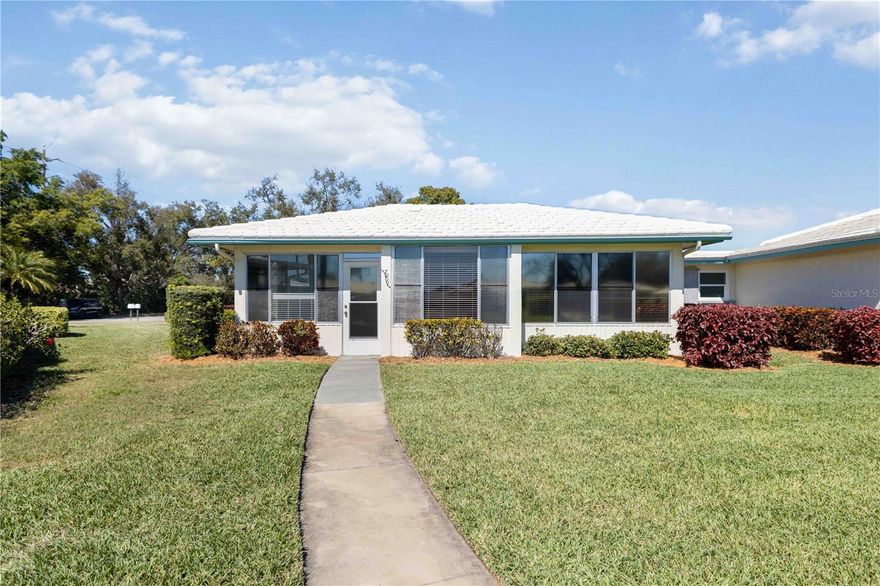 Discover exceptional value and effortless Florida living in this well-maintained two-bedroom, two-bath villa in the desirable Village Green community. Combining generous living space, a prime Bradenton location, and true maintenance-free convenience, this home presents an outstanding opportunity for buyers seeking comfort, lifestyle, and long-term value near the Gulf Coast beaches.

The spacious interior offers a bright, open living and dining area with plenty of natural light and room to entertain or simply relax. The functional kitchen provides ample cabinetry and workspace and connects easily to the main living areas. A unique bonus is the oversized laundry room with a built-in desk, perfect for a home office, craft space, or extra storage—an uncommon feature in this price range.

The primary bedroom serves as a comfortable private retreat with its own en-suite bathroom, while the guest bedroom and second full bath offer flexibility for visiting family and friends. The thoughtful layout lives larger than expected and offers excellent potential for buyers wanting to personalize a home while enjoying immediate comfort.

Village Green is especially attractive for buyers looking for a lock-and-leave lifestyle, with maintenance-free exterior care included so you can focus on enjoying Florida instead of maintaining a property. The pet-friendly community features mature tropical landscaping, peaceful surroundings, and a heated community pool perfect for year-round enjoyment.

Location is everything, and this home delivers. You are just minutes from IMG Academy, GT Bray Park, golf courses, medical facilities, shopping, and dining. The pristine beaches of Anna Maria Island and Bradenton Beach are only a short drive away, making spontaneous beach days and sunset dinners part of your everyday lifestyle.

Opportunities at this price point in such a well-located, maintenance-free community are becoming increasingly rare. Whether you're searching for a winter home, investment property, or full-time residence, this property offers an excellent chance to secure your place in one of Bradenton’s most convenient locations.

Schedule your private showing today and see why Village Green remains one of Bradenton’s most sought-after villa communities.