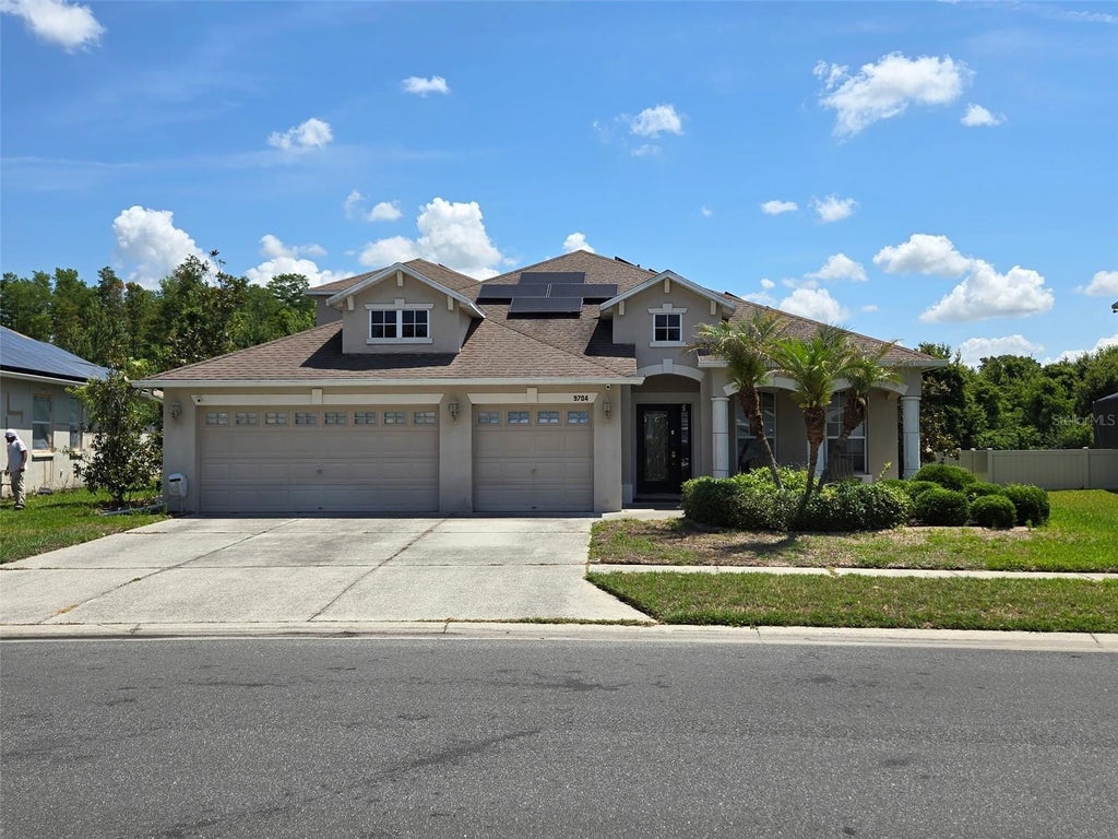 Photo of 9704 Asbel Estates Street, Land O Lakes, FL 34638 (MLS # TB8554420)