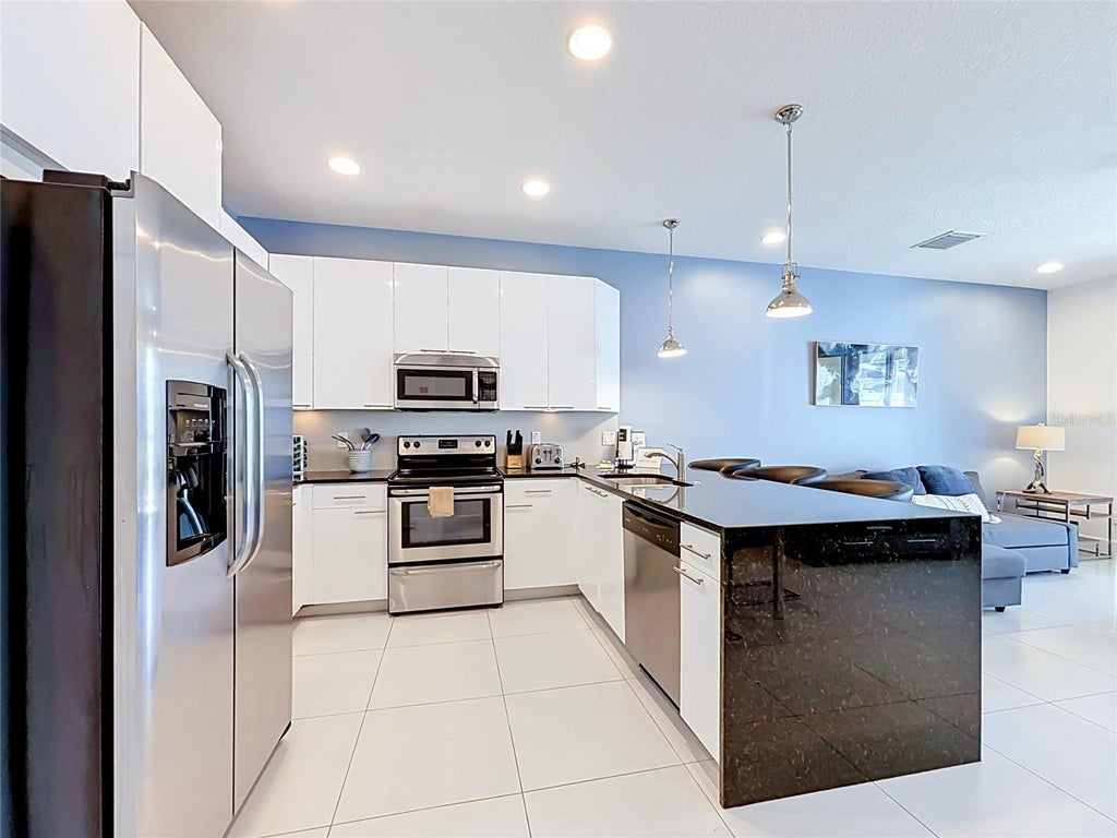 Photo of 17508 Placidity Ave, Clermont, FL 34714 (MLS # O6442644)