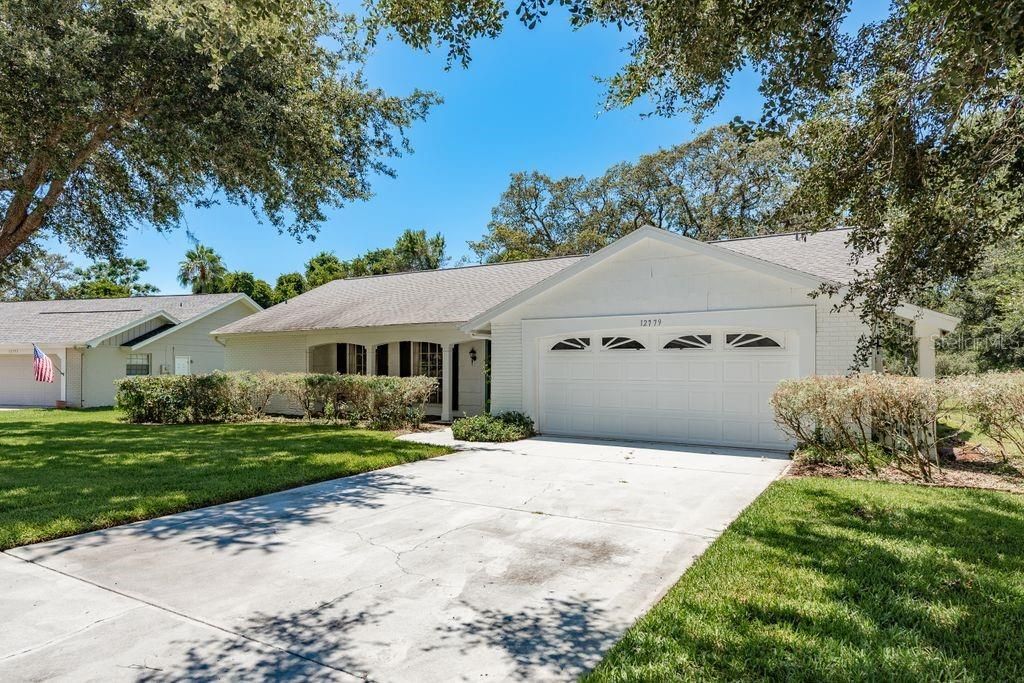 Photo of 12779 Ironwood Circle, Hudson, FL 34667 (MLS # TB8413832)