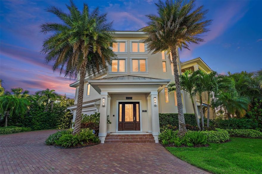 Prime Pass-a-Grille Gulf front property with a private beach access to Tampa Bay’s most coveted Gulf front location.  Arguably, this oversized, unusually private lot is one of the best settings, if not the top, along Tampa Bay’s Gulf coastline. The spectacular unobstructed water views stretch the coastline from the south end of Pass-a -Grille, north past the majestic Don CeSar Hotel, all the way up the coast to Indian Rocks Beach. This art deco inspired home provides classic luxury and relaxed privacy in an urban beach front setting. The three-story staircase, seemingly floating, is a work of art. Ceiling detail enhances each of the home’s three floors displaying the homes high quality craftsmanship from both the design architect and the builder.  There are five spacious bedrooms, all en-suite and with built in European cabinetry, on the second floor.  The luxurious owner’s suite, a guest suite, and two of the bedrooms all overlook the Gulf with access to a continuous balcony.  The fifth en-suite bedroom is also designed to function as a retreat or sitting area.  The great room on the third floor provides a penthouse feel with floor to ceiling windows across the entire Gulf front side of the home providing endless views of the Gulf of Mexico. A spacious, fully equipped kitchen with natural gas cooking and ample counter seating is designed for stylish entertaining with double islands, wine and beverage chillers, additional sink, built in bar and icemakers.  Behind the main kitchen is a custom designed catering kitchen with a full size refrigerator, sink,  dishwasher ample storage and prep space. A library styled office with rich built-ins, captivating ceiling design, and extensive woodwork has a Queen Murphy bed with hidden access behind a bookcase to the adjoining bathroom for additional guest accommodation.  The great room with its mahogany floors and all encompassing open design is spectacular and is further enhanced by a covered porch on the Gulf with a full wall of glass - a Nanawall, imported from Germany, which opens fully to create an indoor/outdoor experience. The first floor plays host to a large foyer with elevator station and abundant natural light from double doors which lead to work-out room and indoor cabana, all built to high quality finishes. Stepping outside, enjoy covered and open outdoor seating areas, an outdoor kitchen with built-in gas grill, an enormous storage room for paddle boards, kayak storage and other beach toys, and the oversized pool.  An enticing trail takes you from the large landscaped back yard to the white Gulf sands and blue green waters of Pass-a-Grille. Throughout there are technology and design enhancements for security and convenience; three station elevator,  Savant Home Automation System, and a whole house generator to name a few.  Aside from the rare ample driveway parking, the home is enhanced by a four car, oversized garage with temperature control, finished floors and storage area.  Quick access to I-275, airports, the Sunshine Skyway and downtown St. Petersburg.  St. Pete Beach has been designated by Trip Advisor as a # 1 beach destination in the USA many years in a row. This home, which has been featured in the Tampa Bay Magazine, will be revered by its owners for centuries.