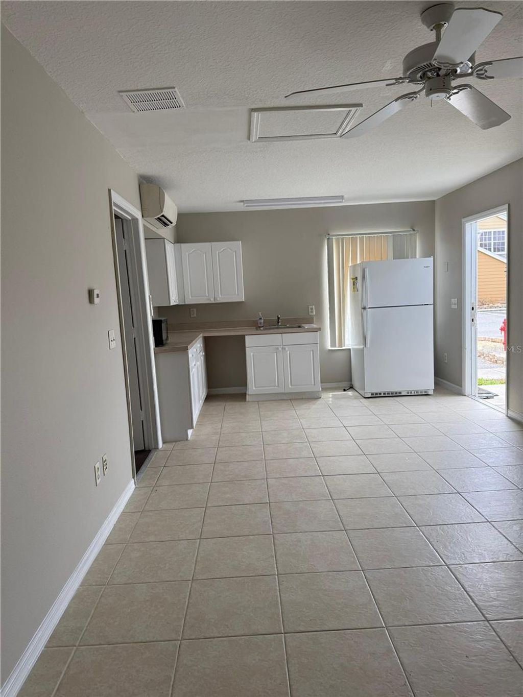 Photo of 631 Washington Palm Loop #5, Davenport, FL 33897 (MLS # O6392210)