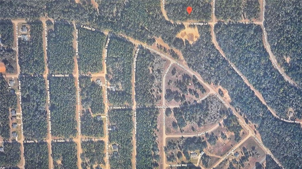 Photo of 593 E Malaga Lane, Dunnellon, FL 34434 (MLS # O6411248)
