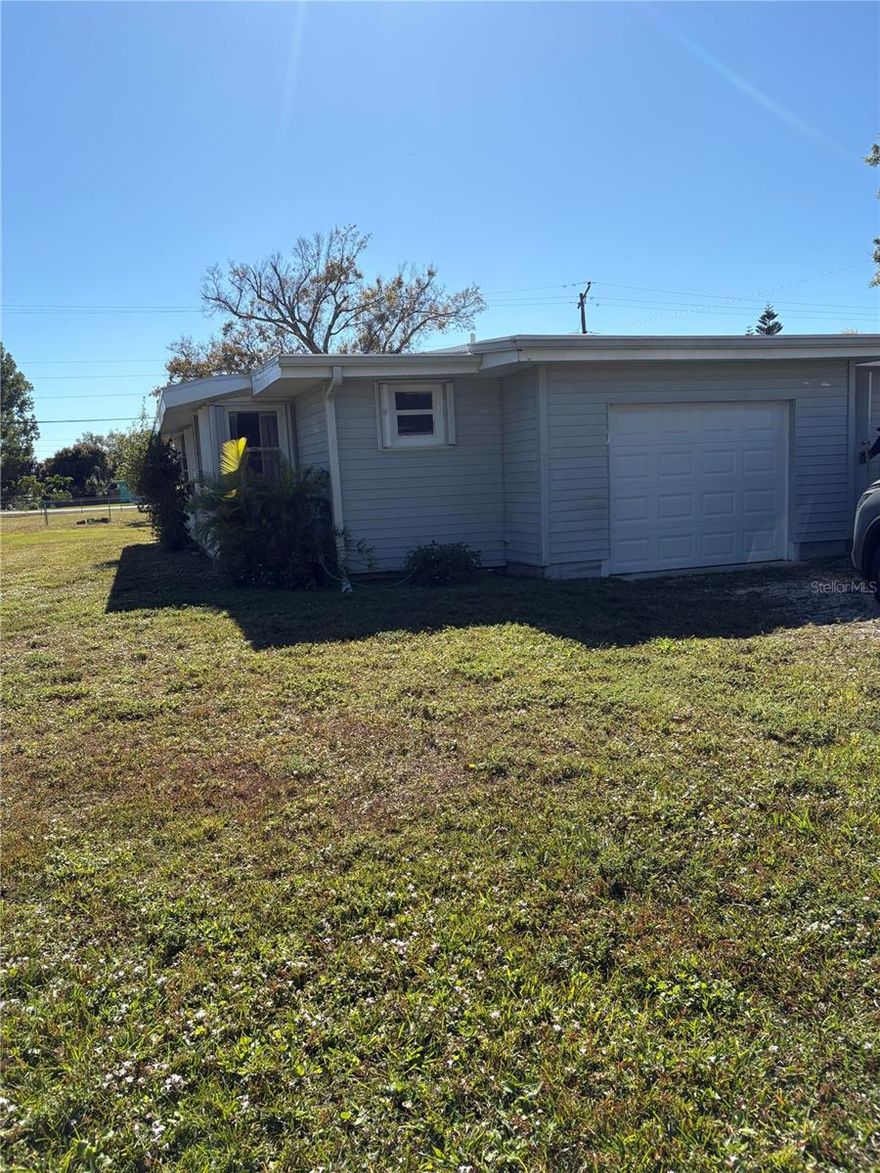 Starter home or investment opportunity. Oversized corner lot. 3 bedroom, 2 bath and one car garage. Heart of Punta Gorda. Close to schools, hospital, doctor's offices, shopping. Easy to show. Needs TLC.