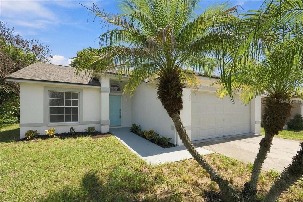 Photo of 352 Lake Daisy Circle, Winter Haven, FL 33884 (MLS # TB8549558)