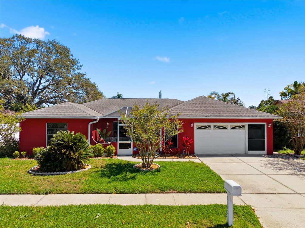 Photo of 1102 Springtime Drive, Holiday, FL 34691 (MLS # TB8490757)