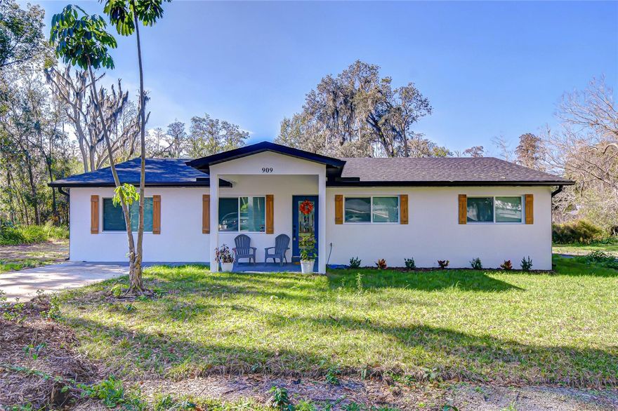 Looking for NO HOA - here it is! Stunning remodeled 4-bedroom, 3-bath home on a large, private wooded lot with room to add a pool or outdoor living area. The updated kitchen includes an oversized island with breakfast bar, quartz countertops, stainless steel appliances, and a butler’s area, offering plenty of space for daily use and entertaining. The split floor plan features two primary suites with en-suite baths, plus two additional bedrooms sharing a full bath. Bathrooms are updated with quartz countertops and walk-in showers. Recent major updates include a new HVAC system (2025), new well (2025), and new septic tank (2025). More than a half acre of land with woodsy back area - great to put additional or garages. Private setting, modern updates, and move-in ready condition make this a solid option for buyers seeking space and flexibility. Conveniently located to medical, restaurants, shopping, and major roadway access. Minutes to Tampa International Airport, the International Mall, downtown Tampa and St. Petersburg, all sports venues, and Florida's gulf beaches.  A hidden gen to see!