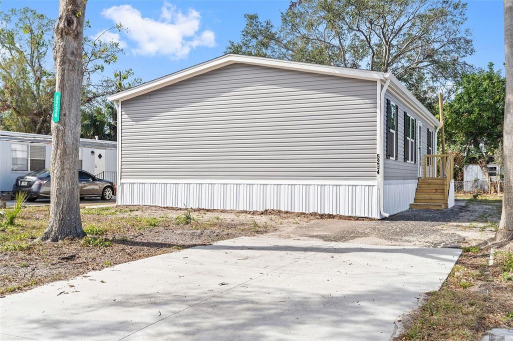 Photo of 5234 Yellow Pine Street N, St Petersburg, FL 33709 (MLS # TB8481788)