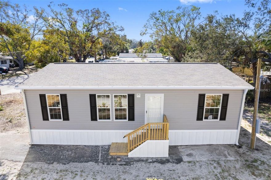 NOW IS THE TIME TO BUY! You own the land—NO HOA, NO deed restrictions, NO flood insurance required, and NO lot rent! Just 10 minutes from the beautiful beaches—bring your toys and your big dogs! This modern 2024 manufactured double-wide home was newly constructed and completed in 2024 and includes a builder’s warranty. Designed with comfort and functionality in mind, it features a bright split floor plan with 3 bedrooms, 2 baths, and a convenient inside laundry room. The spacious, well-appointed kitchen offers abundant cabinetry, generous counter space, and a large island—perfect for entertaining family and friends. Enjoy brand-new, state-of-the-art appliances and ample storage throughout. The open-concept layout seamlessly connects the living and dining areas, creating an ideal space for gatherings or everyday living. A newly installed wooden fence enhances the backyard, adding privacy and charm. Centrally located in the heart of St. Petersburg, this home places you approximately 5 miles from Madeira Beach and 6.2 miles from Treasure Island. Outdoor enthusiasts will love easy access to the Pinellas Trail—perfect for walking, running, and cycling—along with numerous nearby parks and recreational areas. areas. Conveniently located near Bay Pines VA Healthcare System, Publix, Tyrone Square Mall, and the Seminole shopping centers, you’ll also enjoy an abundance of restaurants and entertainment options just minutes away. This home offers the perfect blend of location, lifestyle, and freedom. Schedule your private tour today and make this your new Florida home!
