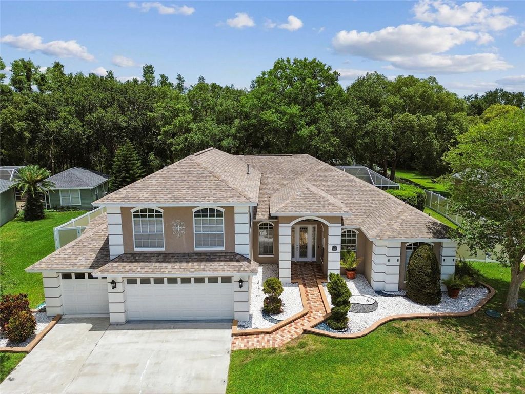 Photo of 1460 Kensington Woods Drive, Lutz, FL 33549 (MLS # TB8393303)