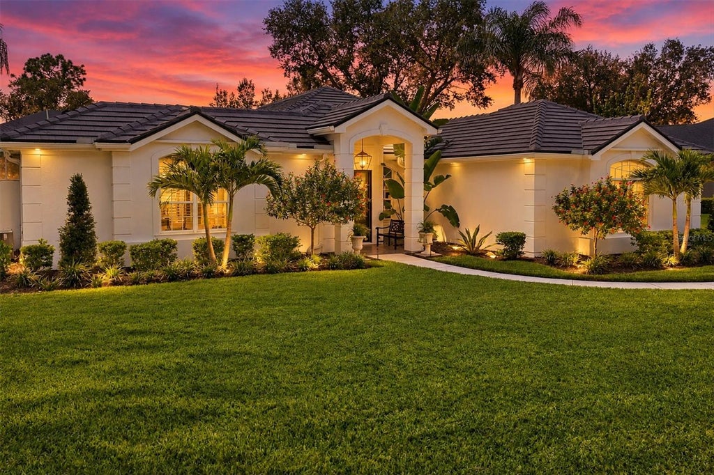 Photo of 8708 Woodbriar Drive, Sarasota, FL 34238 (MLS # A4705215)