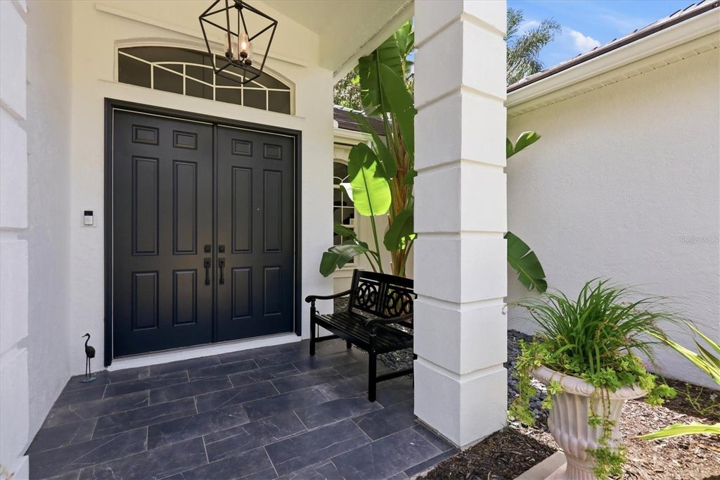 Photo of 8708 Woodbriar Drive, Sarasota, FL 34238 (MLS # A4705215)