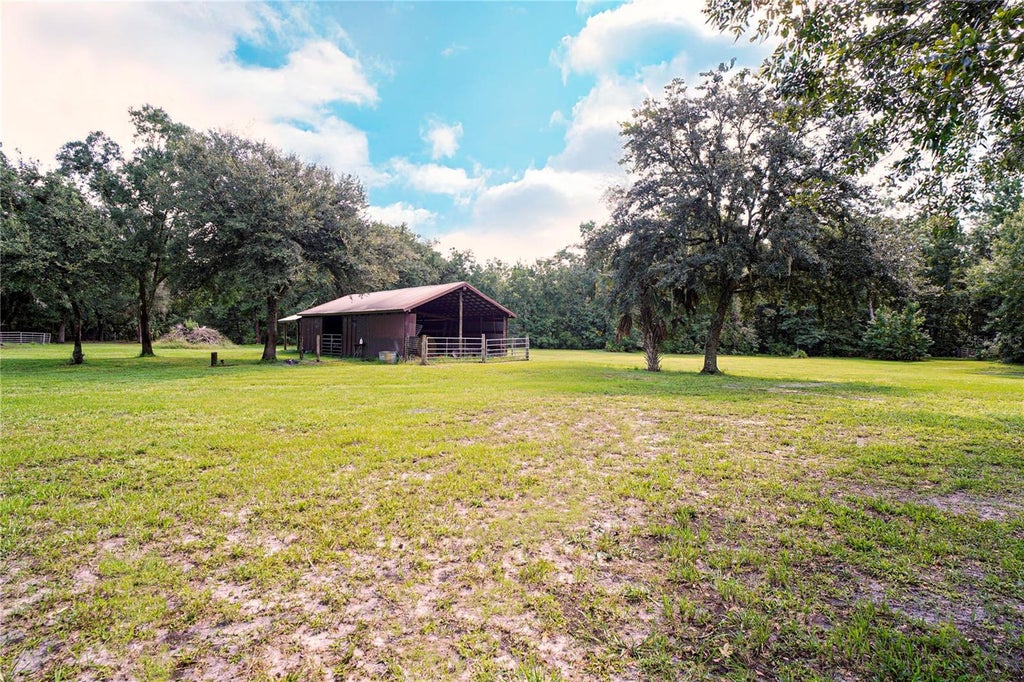 Photo of Karlotta Lane, Land O Lakes, FL 34639 (MLS # TB8548132)