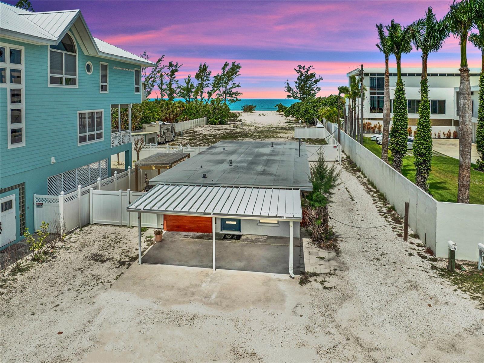 Just steps from the sand and surf, this Nokomis Beach retreat offers the perfect blend of coastal charm and modern comfort, with private deeded beach access to the Gulf of Mexico right at the end of your street. Inside, you’ll find a thoughtfully updated beach cottage featuring uniform flooring throughout, two bedrooms, one and a half bathrooms, and a flexible den or office space. The primary bedroom offers private outdoor access, while French doors lead to a dreamy backyard escape complete with a pergola-covered patio, built-in grill, outdoor shower, and fully fenced yard made for barefoot mornings and sunset gatherings. Recent upgrades include a new roof (2020), HVAC mini-split systems (2023), and updated stainless steel appliances, making this home as practical as it is beautiful. When you are not relaxing at home or soaking up the sun at the beach. Beyond the front door, you’re immersed in one of the most beloved coastal communities in the Sarasota area. Nokomis Beach and North Jetty Park are just around the corner, offering fishing spots, picnic areas, playgrounds, boat ramps, and unbeatable Gulf and Intracoastal views. Residents enjoy panoramic water scenes and scenic access to the Legacy Trail for biking, jogging, and wildlife watching. Whether you're seeking a full-time beach lifestyle, seasonal getaway, or investment opportunity, this is the kind of home that makes you slow down, breathe deep, and never want to leave. ¤ Please see 3D Tour and Video ¤