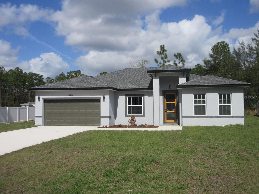 Photo of 6765 SW 152nd Lane Road, Ocala, FL 34473 (MLS # OM712973)
