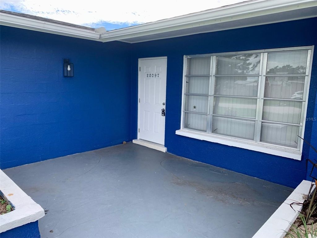 Photo of 22097 Bronxville Avenue, Port Charlotte, FL 33952 (MLS # C7515826)