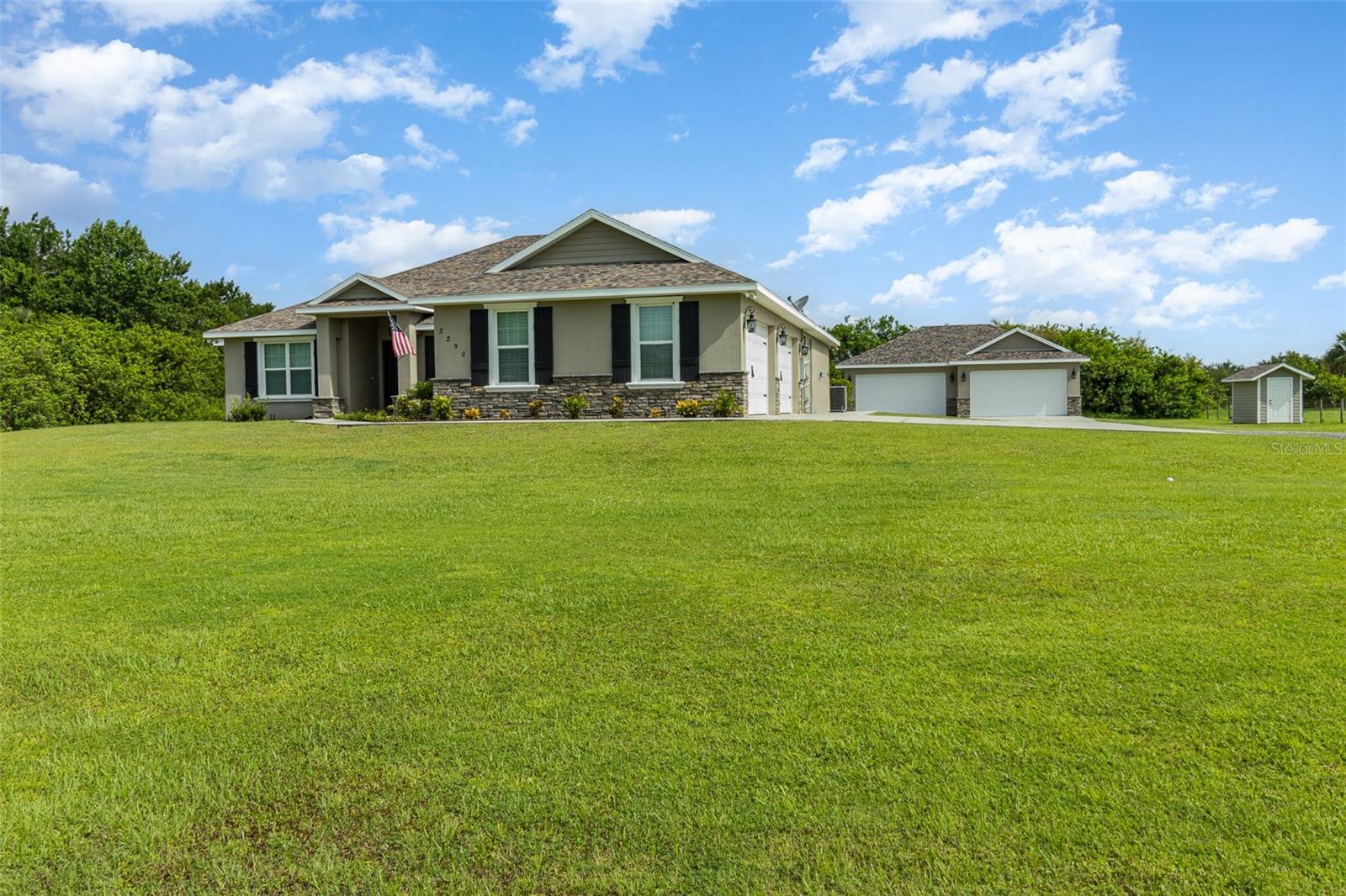 Under contract with a Kickout Clause, please continue to show and make offers. The home you have been waiting for is here! This beautiful 4 bedroom 2.5 bath with an attached 4 car garage and a detached 1,200 Sq. Ft. finished garage to match the house all situated on 1.46 acres in the country. This custom built home offers 2,600 sq. ft. of living space with a split bedroom floor plan. Once inside you will notice the attention to detail put into this home starting with plantation shutters on nearly every window, crown molding, tiled backsplashes, and even a pot filler in the kitchen. The 14x21 master suite offers a large walk in closet, tile shower with custom inlays and glass doors, a soaking tube, as well as access to the laundry room complete with storage, wash sink, and plenty of counter space. There is plenty of room to add a pool if you desire!