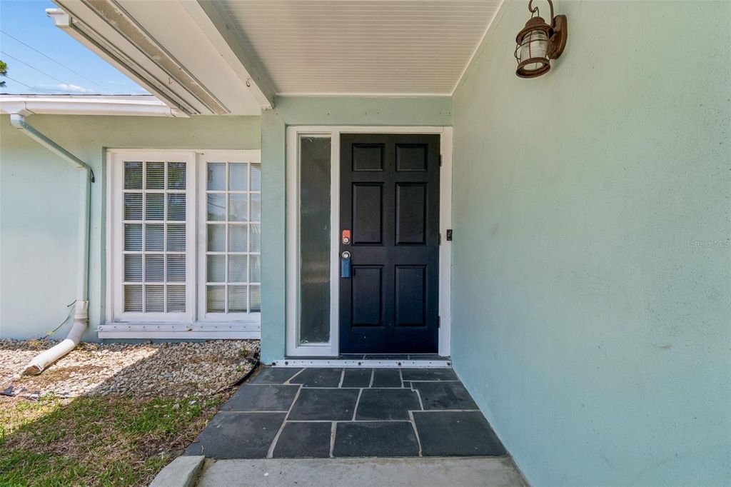 Photo of 13691 Serena Drive, Largo, FL 33774 (MLS # TB8506261)
