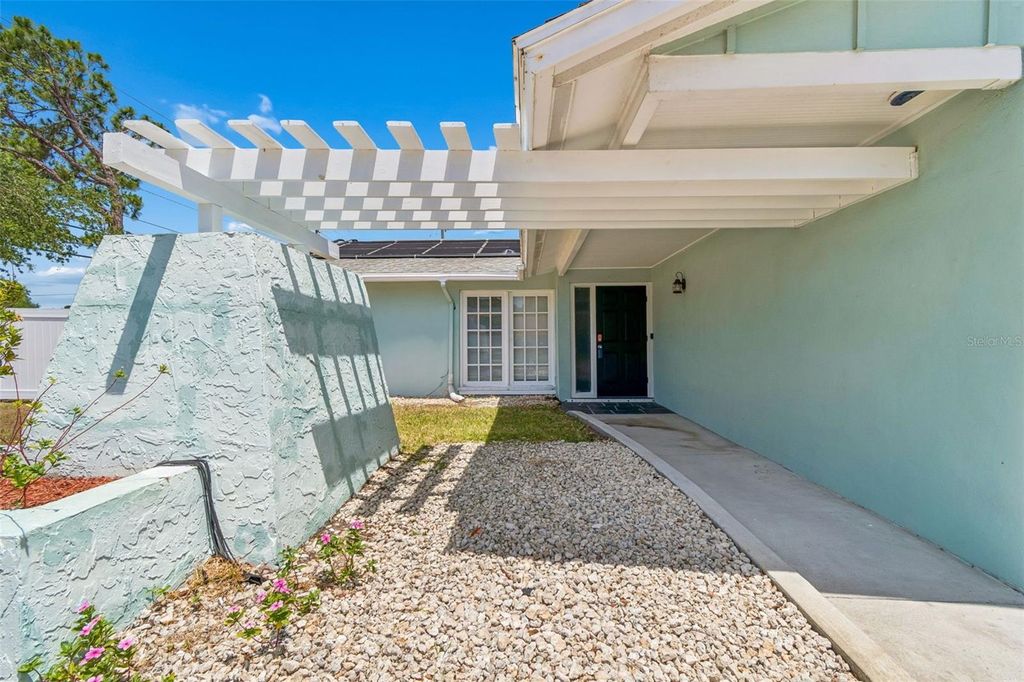 Photo of 13691 Serena Drive, Largo, FL 33774 (MLS # TB8506261)