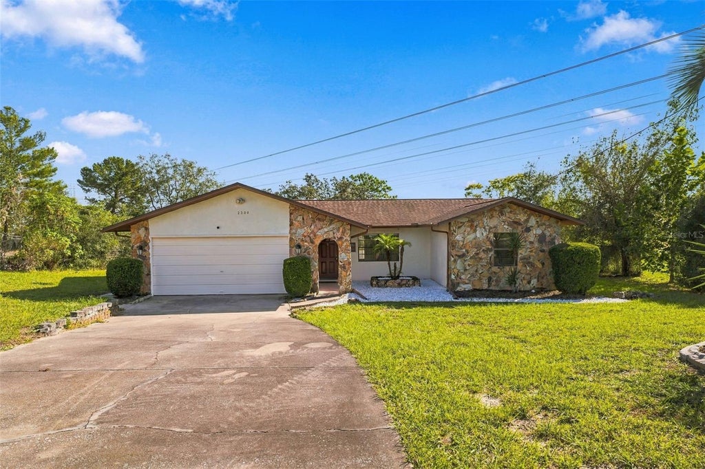 Photo of 2500 Rim Drive, Spring Hill, FL 34609 (MLS # W7890495)