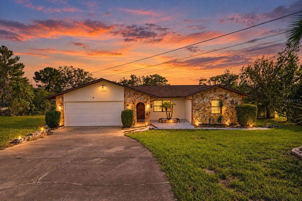 Photo of 2500 Rim Drive, Spring Hill, FL 34609 (MLS # W7890495)