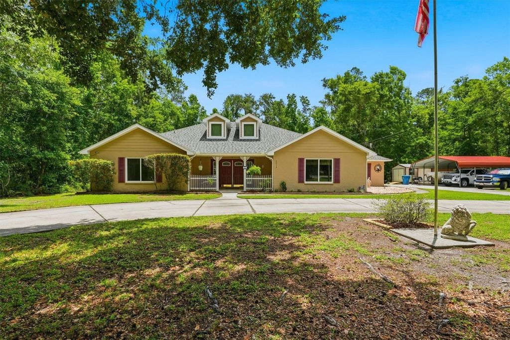 Photo of 6012 Valley Spring Drive, Brooksville, FL 34601 (MLS # OM725474)