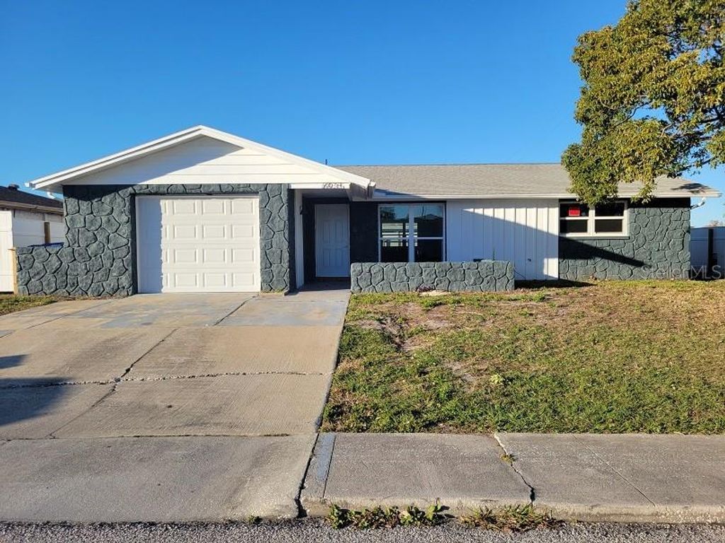 Photo of 6935 Alta Vista Street, Port Richey, FL 34668 (MLS # W7884186)