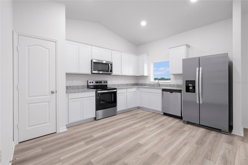 Photo of 620 Tangelo Terrace, Babson Park, FL 33827 (MLS # TB8555531)