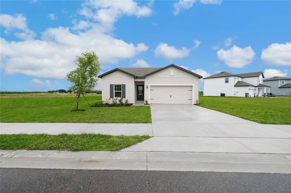 Photo of 620 Tangelo Terrace, Babson Park, FL 33827 (MLS # TB8555531)