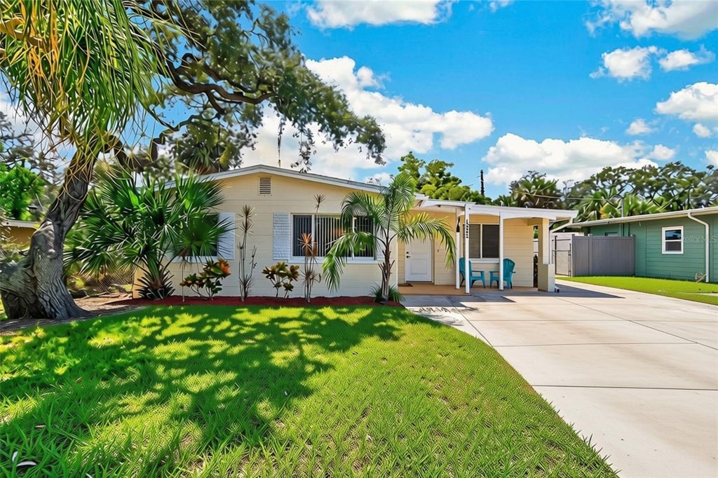Photo of 10840 50th Avenue N, St Petersburg, FL 33708 (MLS # TB8551114)