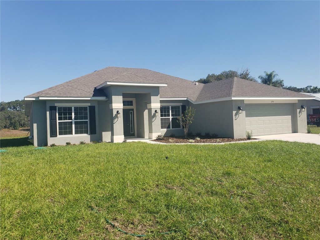 Photo of 278 Waterfall Drive, Spring Hill, FL 34608 (MLS # OM703406)