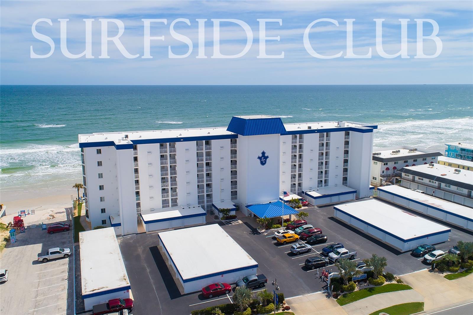 Enjoy postcard-worthy panoramas of the brilliant blue Atlantic coastline from this updated and turnkey beach escape. Direct surfside scenes are the daily backdrop from this inviting condo that features modern LVP flooring throughout, custom ceiling fans, and charming wall accents. The kitchen is white, bright and ready for convenient meal prep. The primary suite provides opulent oceanfront views with balcony access. Plus, this condo comes with a deeded one-car garage and the convenience of a private storage unit. At Surfside Club residents enjoy a convenient location near bridge access, with community amenities that include an oceanfront, zero-entry heated swimming pool, an oversized pool deck, and more. This condo community allows one-month rentals which can help owners produce rental income if desired. Don't miss your chance at one of Florida's best beach condos!