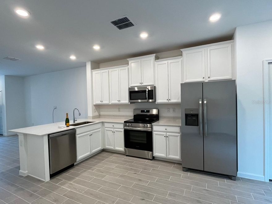 Beautiful 2-bedroom, 2.5-bath townhome located in the desirable College Park community in Ocala. This well-maintained property features a modern kitchen with quartz countertops, tile flooring throughout the first floor, and a comfortable layout perfect for everyday living. The second floor and stairs are finished with carpet for added warmth and comfort. Spacious bedrooms with ample closet space and natural light. Conveniently located near shopping, dining, and major highways. All renters are welcome. Don’t miss this great rental opportunity!