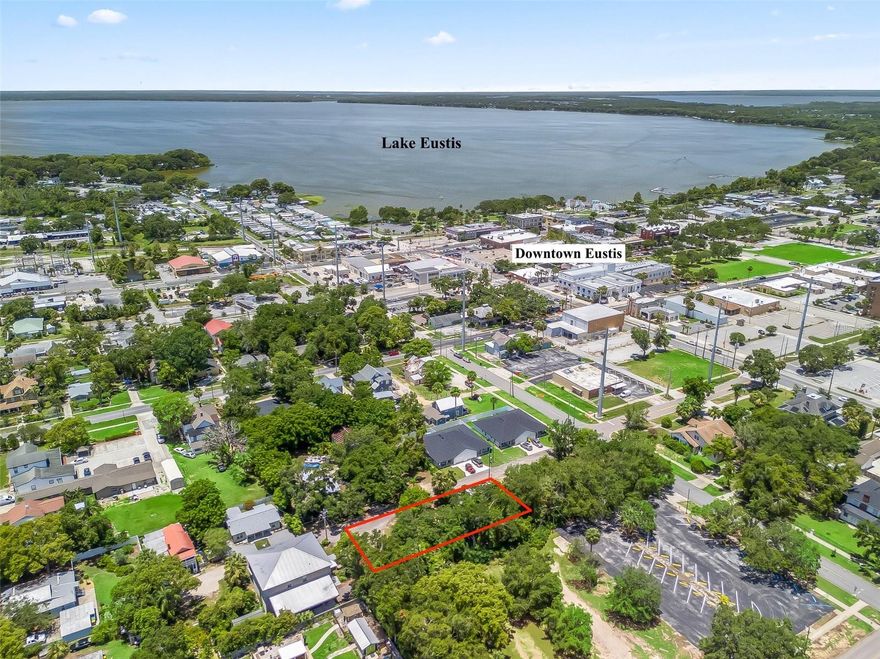 Rare Investment Opportunity – Build a Triplex Just 2 Blocks from Downtown Eustis!

This ±11,250 sq ft (0.258-acre) vacant lot offers zoning that permits up to three residential units—an ideal site for a triplex. Situated just steps from the vibrant shops, restaurants, and lakefront of Downtown Eustis, this area is experiencing steady growth. Located in an area with strong rental demand - nearby newly built 2024 duplexes are renting for $1,900–$2,000 per unit. The lot is flat, and ready for development, with city water and sewer available to help reduce build-out costs. 

Whether you're a developer or a buy-and-hold investor, this is a prime opportunity in a highly walkable and desirable location. Eustis is located in the "Golden Triangle" with Tavares and Mount Dora, both offering vibrant downtowns and many restaurants, shops and attractions.